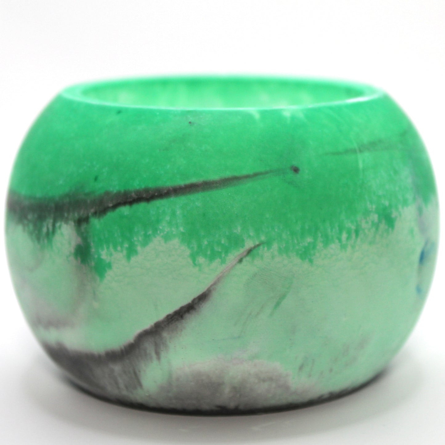 "Handcrafted Ecocrete candle holder featuring the black, white and green colors of the agender pride flag, elegantly blended together. Set against a clean white background, this unique design celebrates identity and personal expression. Perfect for LGBTQ+ decor, pride gifts, and home ambiance.