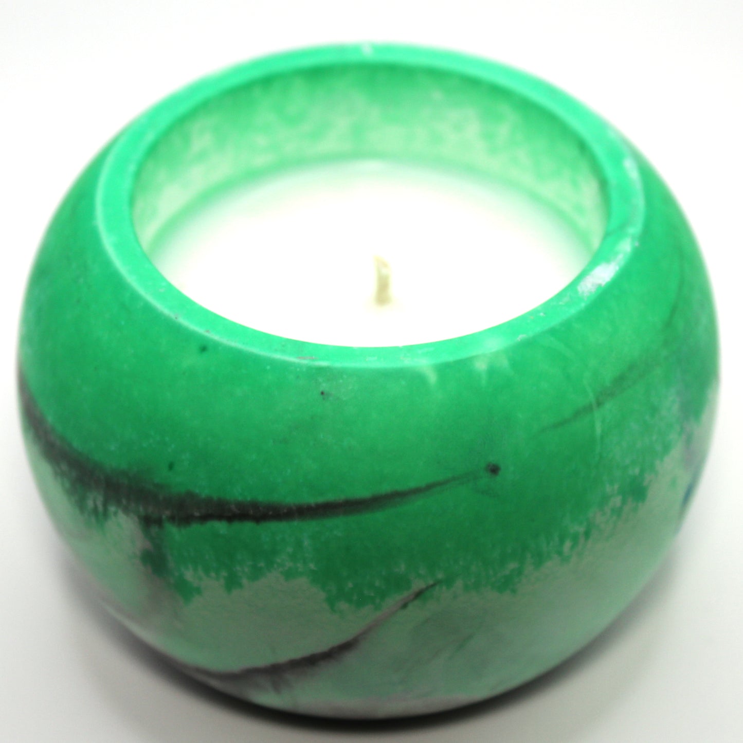 3/4 top-down view of a handcrafted candle holder, showcasing the black, white, and green colors of the agender pride flag seamlessly blending together with the white candle clearly visible. Set against a clean white background, this unique design celebrates identity and expression. Ideal for LGBTQ+ home decor, pride gifts, and statement lighting.
