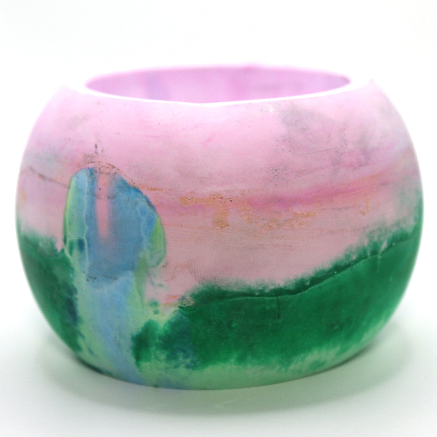 Handcrafted candle holder featuring the vibrant colors of the polysexual pride flag, elegantly blended together. Set against a clean white background, this unique design celebrates identity and personal expression. Perfect for LGBTQ+ decor, pride gifts, and home ambiance.