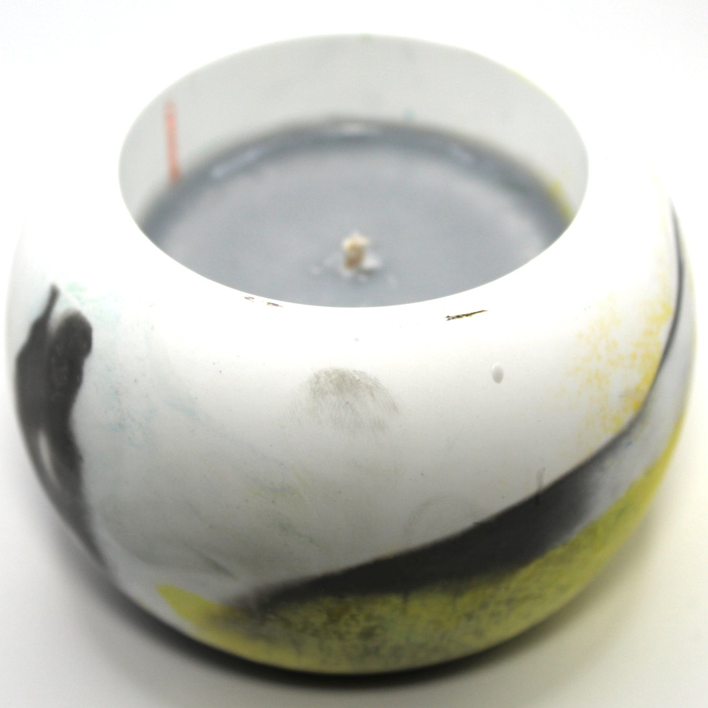 3/4 top-down view of a handcrafted candle holder, showcasing the black, white, and yellow colors of the Demigender pride flag seamlessly blending together with the gray candle clearly visible. Set against a clean white background, this unique design celebrates identity and expression. Ideal for LGBTQ+ home decor, pride gifts, and statement lighting.